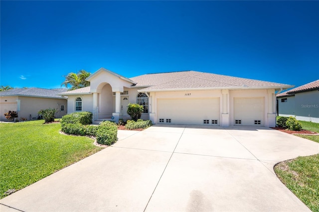 1157 Rotonda Cir, Rotonda West, FL 33947 - ranch-style home featuring an attached garage, concrete driveway, a front yard, and stucco siding