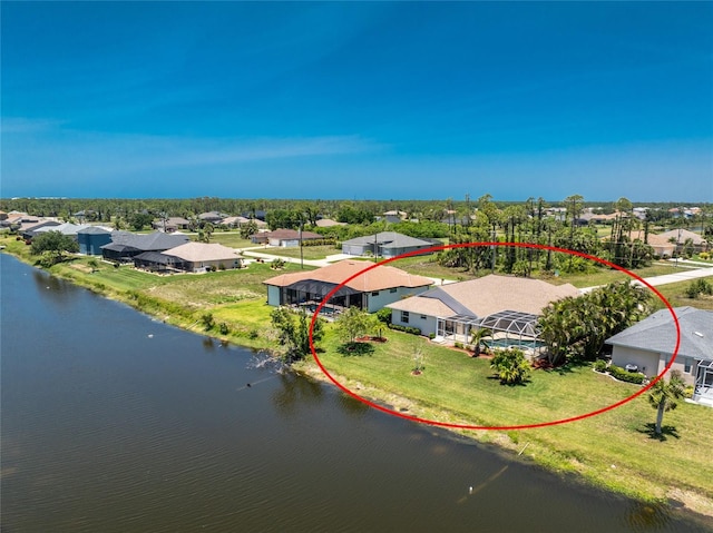 1157 Rotonda Cir, Rotonda West, FL 33947 - aerial view of residential area with a large body of water