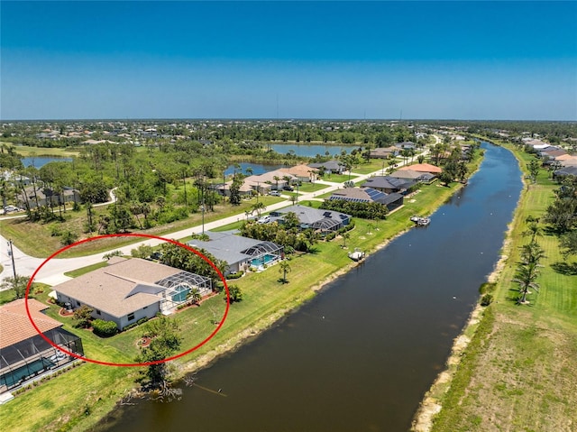 1157 Rotonda Cir, Rotonda West, FL 33947 - aerial view of residential area featuring a large body of water
