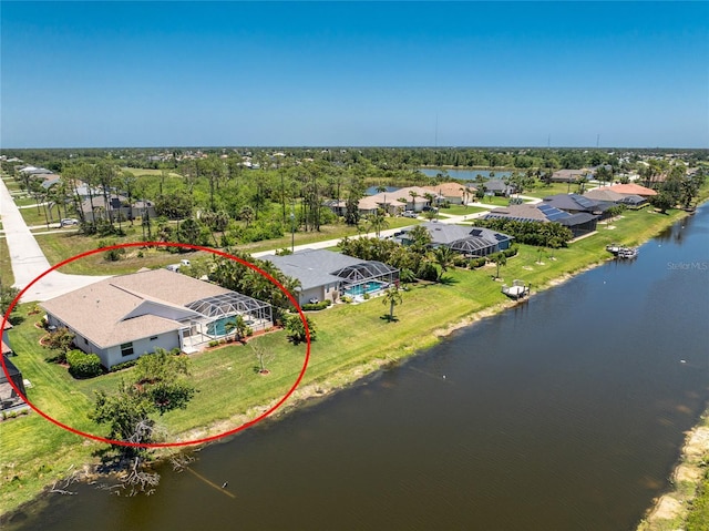 1157 Rotonda Cir, Rotonda West, FL 33947 - aerial view of residential area with a large body of water