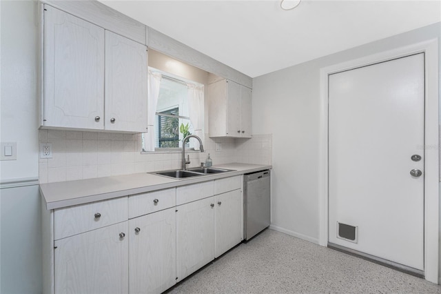 1691 Lakeview Pl, Englewood, FL 34223 - kitchen with dishwasher, a sink, backsplash, and light countertops