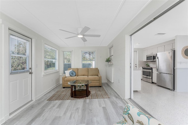 1691 Lakeview Pl, Englewood, FL 34223 - living area with a ceiling fan and baseboards
