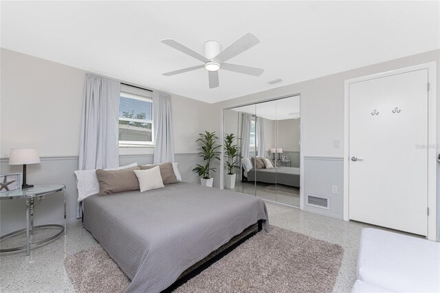 1691 Lakeview Pl, Englewood, FL 34223 - bedroom featuring speckle patterned floor, a closet, baseboards, and ceiling fan