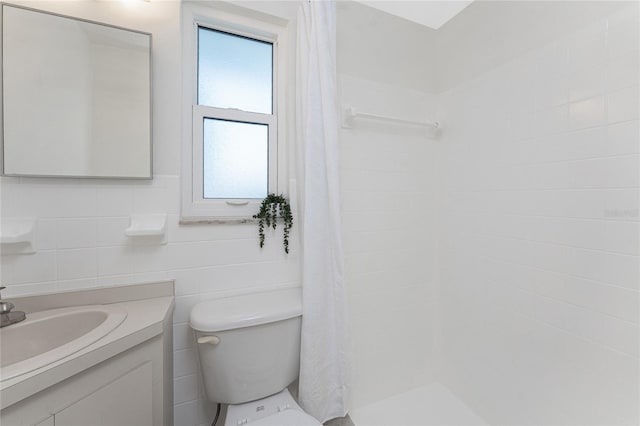 1691 Lakeview Pl, Englewood, FL 34223 - full bathroom with toilet, a tile shower, and vanity