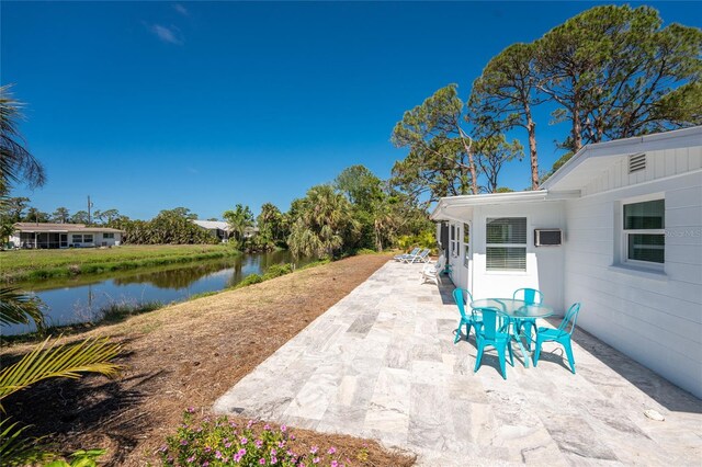 1691 Lakeview Pl, Englewood, FL 34223 - view of patio / terrace with a water view