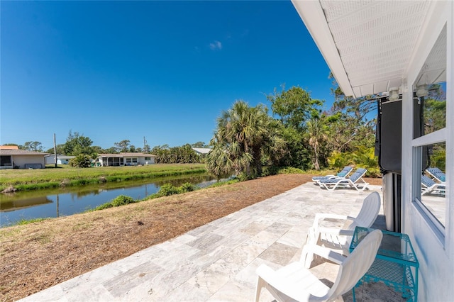1691 Lakeview Pl, Englewood, FL 34223 - view of patio / terrace featuring a water view