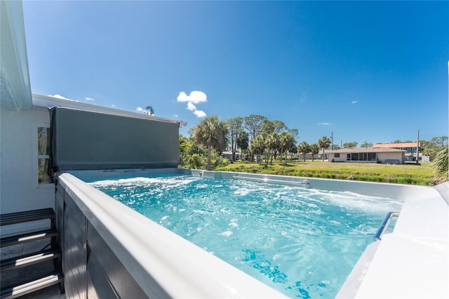 1691 Lakeview Pl, Englewood, FL 34223 - view of swimming pool with a hot tub