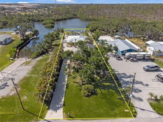2060 Oyster Creek Dr, Englewood, FL 34224 - aerial perspective of suburban area featuring property boundaries highlighted and a large body of water