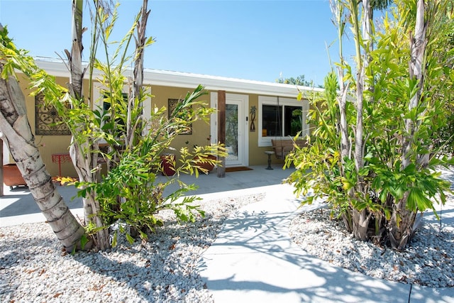 2060 Oyster Creek Dr, Englewood, FL 34224 - view of front of home featuring stucco siding