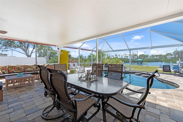 2060 Oyster Creek Dr, Englewood, FL 34224 - view of patio / terrace featuring outdoor dining space, a lanai, and an outdoor pool