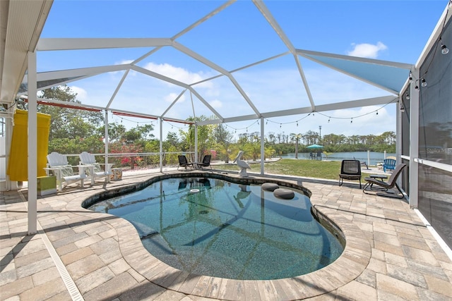 2060 Oyster Creek Dr, Englewood, FL 34224 - swimming pool featuring a patio, glass enclosure, and a water view