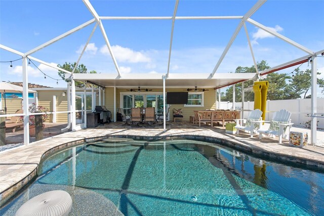 2060 Oyster Creek Dr, Englewood, FL 34224 - view of pool with ceiling fan, a patio, a lanai, and french doors