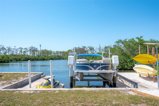 2060 Oyster Creek Dr, Englewood, FL 34224 - dock area with boat lift, a water view, and view of wooded area