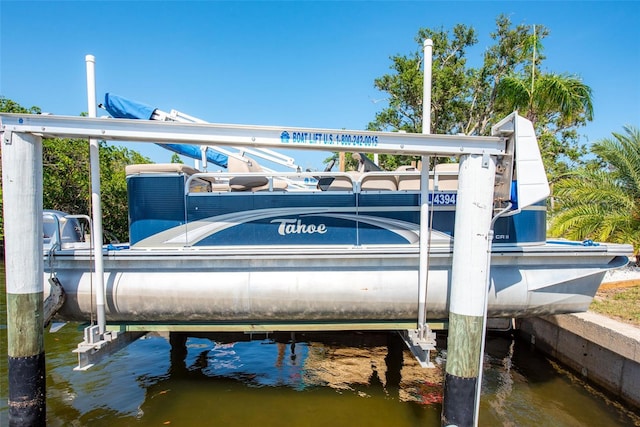 2060 Oyster Creek Dr, Englewood, FL 34224 - dock featuring boat lift and a water view