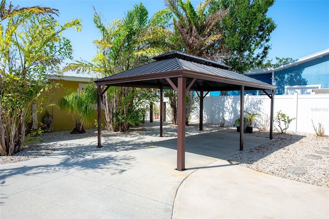 2060 Oyster Creek Dr, Englewood, FL 34224 - view of patio / terrace featuring a gazebo, a carport, and concrete driveway