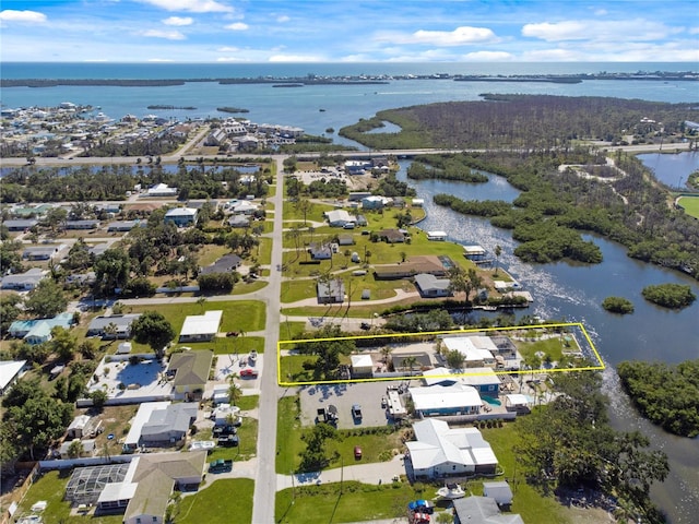 2060 Oyster Creek Dr, Englewood, FL 34224 - aerial view of residential area featuring a large body of water and property parcel outlined