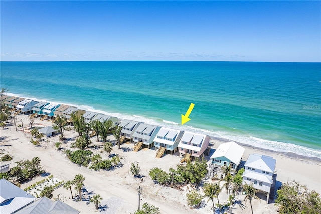 bird's eye view of waterfront with a beach