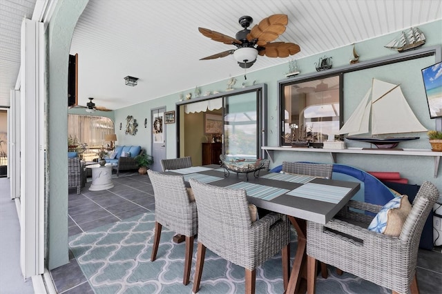 view of patio featuring a ceiling fan and an outdoor living space
