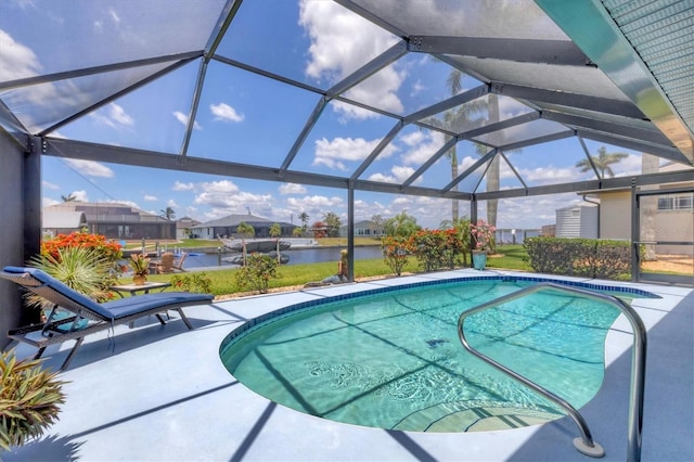 outdoor pool with a patio area, glass enclosure, a water view, and a residential view