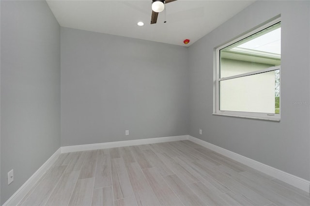 13344 Gershwin Ln, Port Charlotte, FL 33981 - spare room with a ceiling fan, light wood-type flooring, baseboards, and recessed lighting