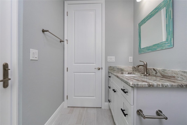 13344 Gershwin Ln, Port Charlotte, FL 33981 - bathroom featuring vanity and baseboards