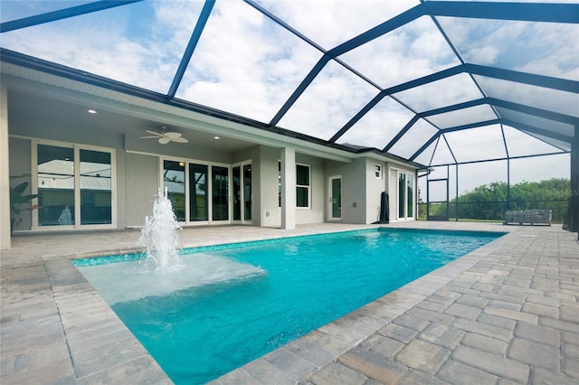 13344 Gershwin Ln, Port Charlotte, FL 33981 - outdoor pool with a patio, a ceiling fan, and glass enclosure
