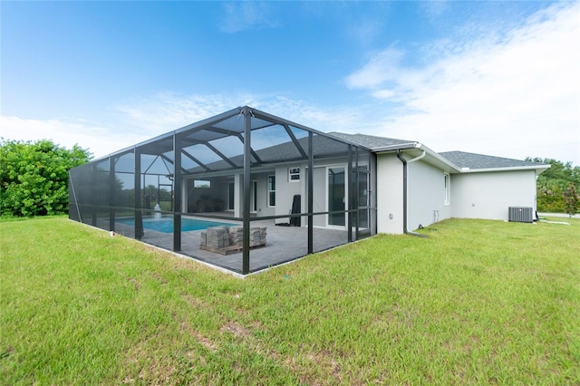 13344 Gershwin Ln, Port Charlotte, FL 33981 - rear view of property featuring a patio area, a lawn, stucco siding, and an outdoor pool