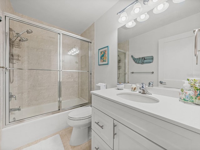 420 Gulf Blvd Unit 4, Boca Grande, FL 33921 - full bath with vanity, combined bath / shower with glass door, toilet, and tile patterned flooring