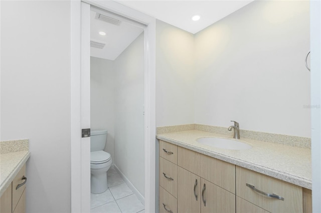 1551 Beach Rd Unit 212, Englewood, FL 34223 - bathroom with vanity, toilet, and tile patterned flooring