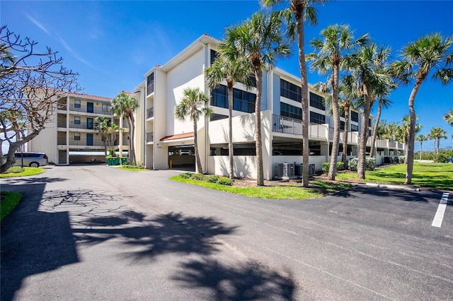 1551 Beach Rd Unit 212, Englewood, FL 34223 - view of property featuring central air condition unit