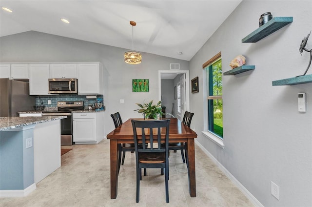 2678 Alva St, North Port, FL 34291 - dining space featuring lofted ceiling, baseboards, and recessed lighting