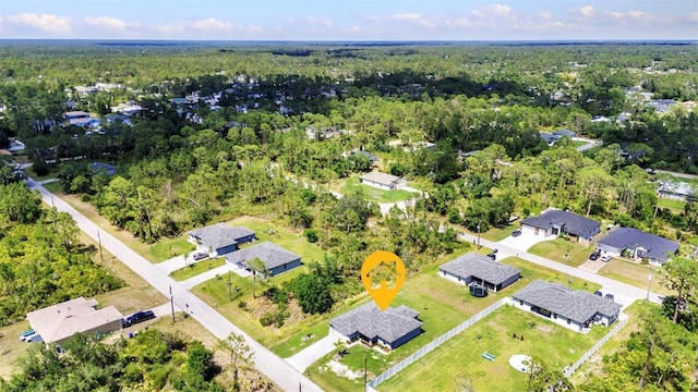 2678 Alva St, North Port, FL 34291 - aerial perspective of suburban area featuring a heavily wooded area