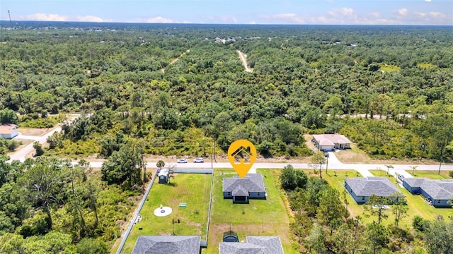 2678 Alva St, North Port, FL 34291 - aerial view of a heavily wooded area