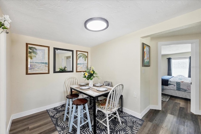 115 Friendship Ln, Englewood, FL 34223 - dining room featuring wood finished floors and baseboards