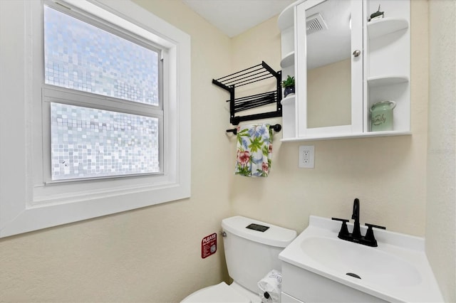 115 Friendship Ln, Englewood, FL 34223 - half bathroom with toilet and vanity