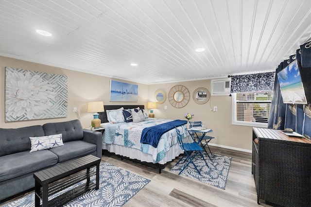115 Friendship Ln, Englewood, FL 34223 - bedroom featuring wood finished floors, recessed lighting, baseboards, wood ceiling, and a wall mounted air conditioner