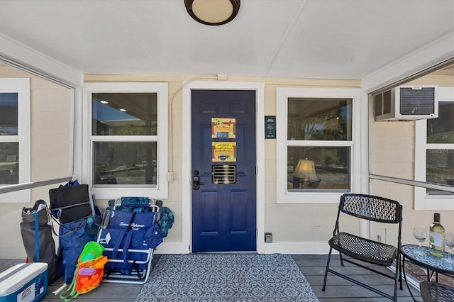 115 Friendship Ln, Englewood, FL 34223 - entrance to property with a wall mounted AC