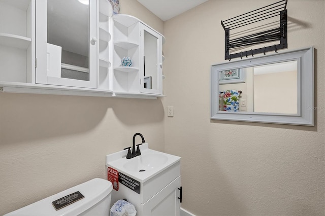 115 Friendship Ln, Englewood, FL 34223 - bathroom with toilet and vanity