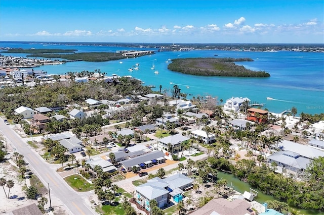 115 Friendship Ln, Englewood, FL 34223 - aerial perspective of suburban area featuring a large body of water