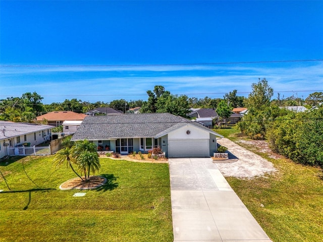 9869 Gulfstream Blvd, Englewood, FL 34224 - single story home featuring an attached garage and concrete driveway