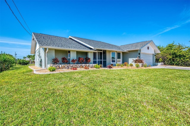 9869 Gulfstream Blvd, Englewood, FL 34224 - ranch-style home featuring concrete driveway, stucco siding, a garage, and a front lawn
