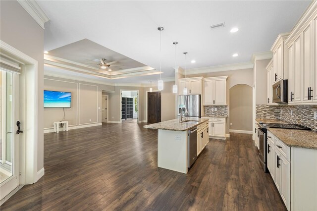 2758 Morrietta Ln, North Port, FL 34286 - kitchen featuring appliances with stainless steel finishes, a sink, open floor plan, ornamental molding, and ceiling fan