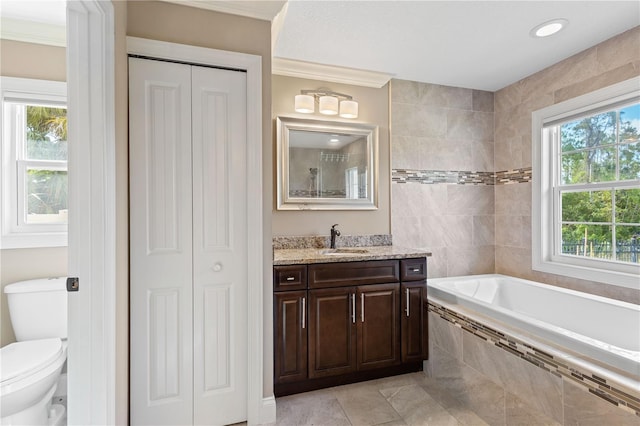 2758 Morrietta Ln, North Port, FL 34286 - bathroom featuring a closet, tiled bath, vanity, toilet, and tile patterned flooring