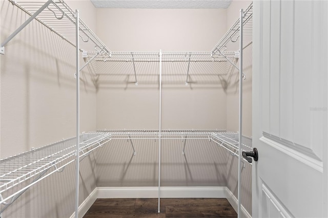 2758 Morrietta Ln, North Port, FL 34286 - walk in closet featuring wood finished floors