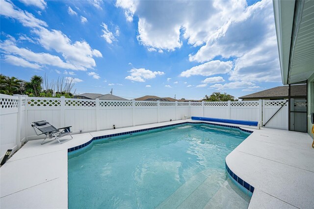 279 Mark Twain Ln, Rotonda West, FL 33947 - view of swimming pool featuring a fenced backyard and a patio