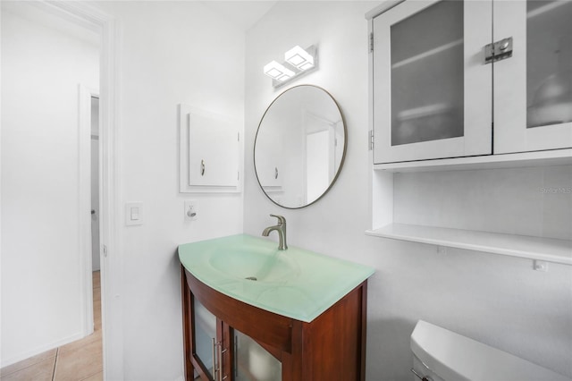 279 Mark Twain Ln, Rotonda West, FL 33947 - bathroom with toilet, vanity, and tile patterned flooring