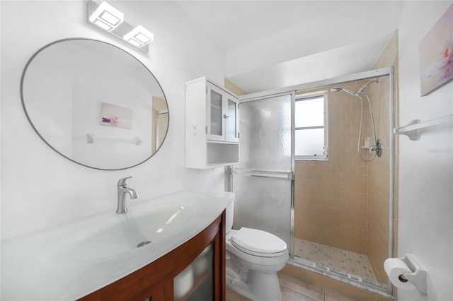 279 Mark Twain Ln, Rotonda West, FL 33947 - full bath featuring a stall shower, toilet, vanity, and tile patterned floors