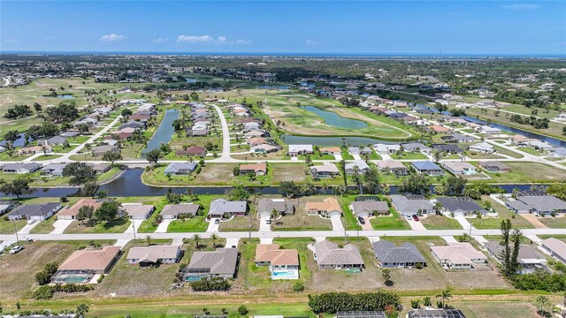 279 Mark Twain Ln, Rotonda West, FL 33947 - aerial overview of property's location featuring nearby suburban area and a nearby body of water