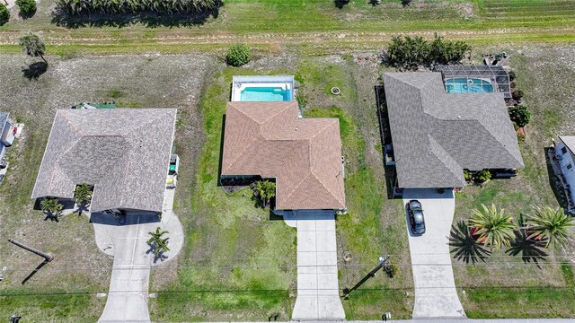 279 Mark Twain Ln, Rotonda West, FL 33947 - view from above of property featuring a pool area