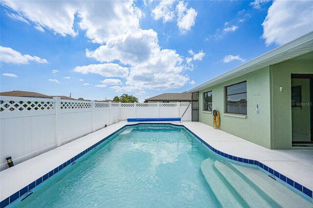 279 Mark Twain Ln, Rotonda West, FL 33947 - view of pool with a fenced backyard